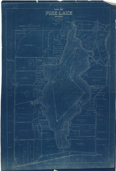 Map of Pine Lake and Vicinity : Waukesha County, Wisconsin This blueprint map shows landownership around the lake. Water depths are shown by soundings; relief is shown by hachures. The map was originally created in 1924 and corrected to 1927.