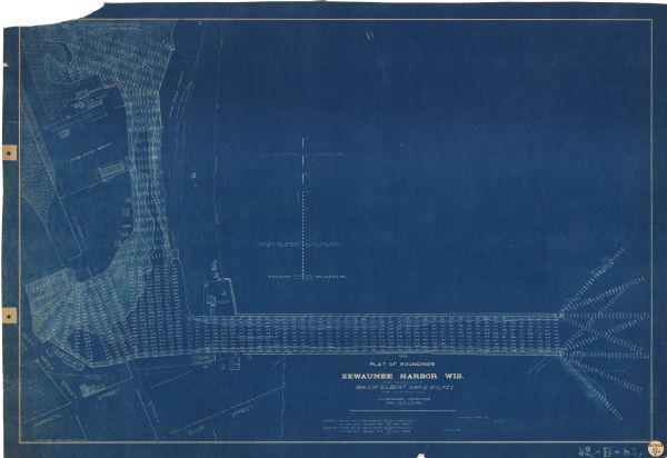 This blueprint manuscript map shows buildings, railroads, and United States property. Water depths shown by soundings, tints, and isolines.