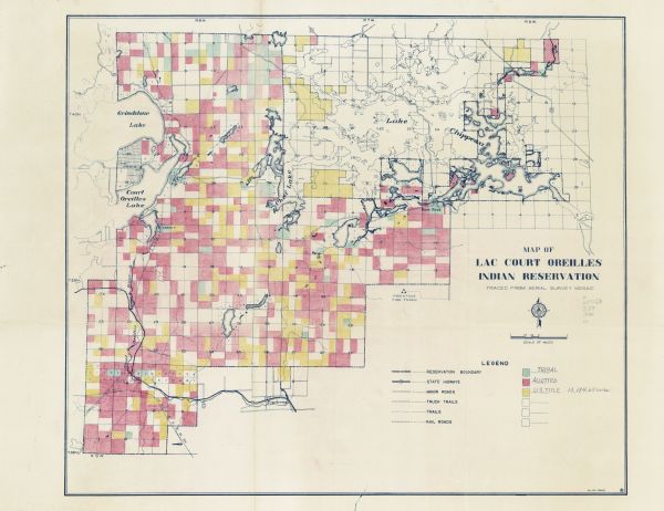This blue line print map traced from aerial survey mosaic shows reservation boundary, roads, trails, and railroads. Color manuscript annotations show tribal (green), alloted (red), and U.S. title lands (yellow). 
