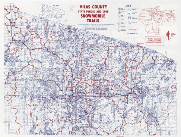 This map covers Vilas county as well as parts of Iron, Oneida, and Forest counties. Club trails are shown in dotted red lines and state trails are shown in solid red lines. The upper right corner includes a location map and a legend of sign postings. The upper left corner includes a maps of "Civil Towns". The back of the map includes several photographs of winter activities including ice skating, skiing, running, hockey, hunting, snowshoeing, and ice fishing. 