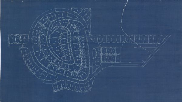 This blueprint plat map shows the plan of lots and streets on a Madison hill south of Lake Monona. Includes annotations showing land prices in pencil.