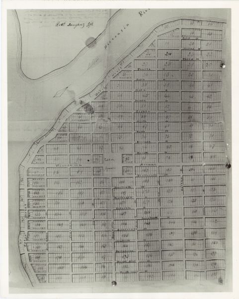 This map shows a paper city laid out in 1836 on the Wisconsin River, now the site of Wyalusing State Park, Grant County. The upper right corner includes a certification signed by Rob't Dougherty.

