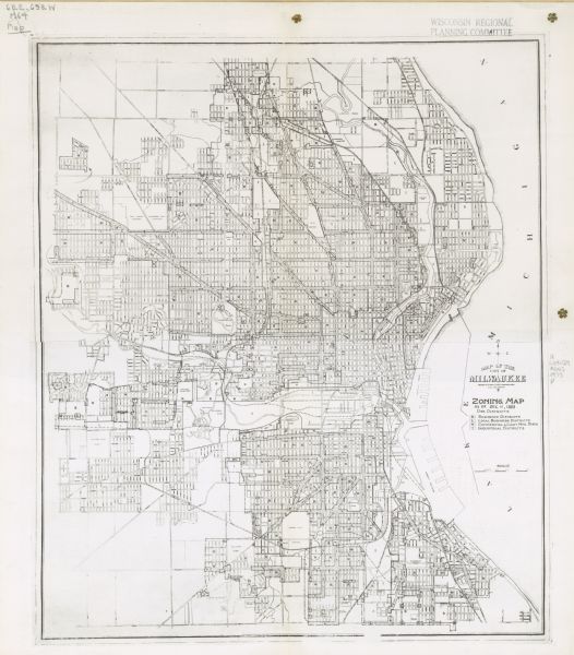 This map shows residence, business, commercial, and industrial districts as well as streets, points of interest, and Lake Michigan. 