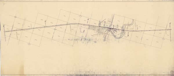 Railroad Right-of-Way Map through Shiocton, Wisconsin and Vicinity This blue line print covers the stretch of railroad numbered 1478+40 through 1689+60. Some streets and blocks in the town and the Wolf River are labeled.
