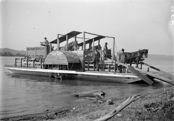 Horse-powered Mississippi River Ferry. This ferry was operated between Turkey river, Iowa and Cassville, Wisconsin by Alfred Dietrich.