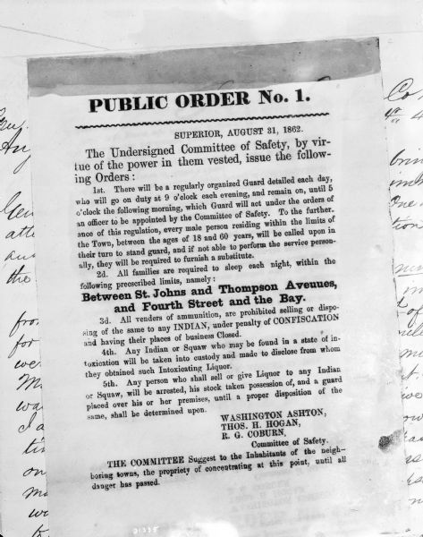 Photograph of a printed broadside, Public Order No. 1., issued by The Committee of Safety. The first order appears to be addressing some kind of dangerous situation by organizing a Guard to patrol after dark. The second order requires families to sleep in a specific area. The third, fourth and fifth orders concern Native Americans, alcohol and firearms.