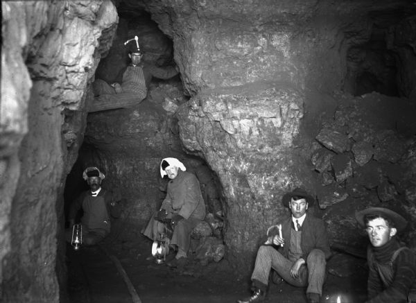 Miners in the bowels of a lead mine.