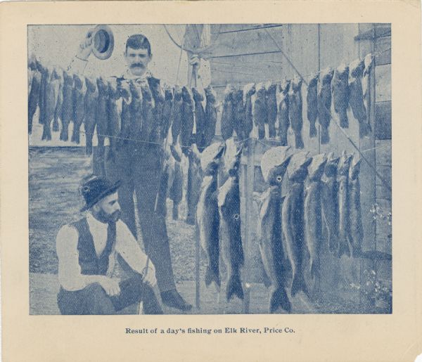 A card depicting two men posed near a stringer holding the many fish they caught. The caption reads, "Result of a day's fishing on Elk River, Price Co."
