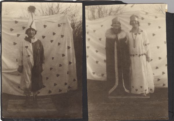 Page from a scrapbook kept by Neighborhood House, with two views of a play performed for Valentine's Day. One side shows a person dressed in jester's attire of a half white and half red? garment and a conical cap standing in front of a backdrop with hearts. The other side is of two women, one in a fur-collared cloak and the other in a long gown trimmed with hearts. Both women are wearing crowns, and are standing in front of a backdrop decorated with hearts.