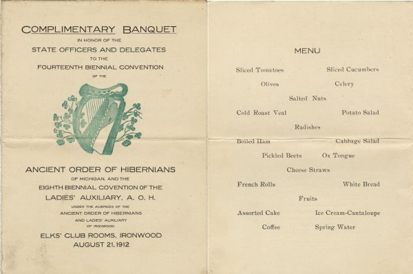 Banquet menu for the Fourteenth Biennial Convention of the Ancient Order of Hibernians of Michigan. On the cover is a Celtic harp adorned with shamrocks, printed in green ink.