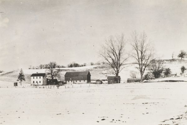 Winter scene with snow-covered fields at the Thomas Pederson farm, near Holmen.