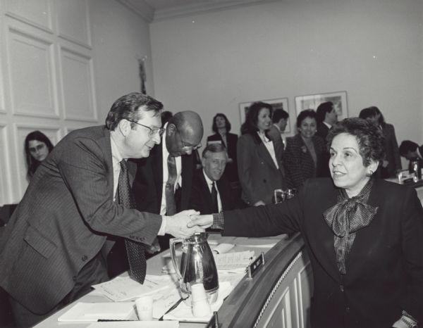 Secretary of Health and Human Services Donna Shalala shakes hands with Congressman David R. Obey of Wisconsin after testifying before the House Appropriations Committee. Shalala was a former Chancellor of the University of Wisconsin-Madison.