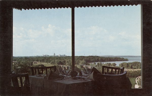 View of the City from the Picture Windows of Dee's Nob Hill View of a dining room with a large picture window, with a view of the Madison skyline across Lake Monona. Located two miles southeast on Highways 12 and 18.