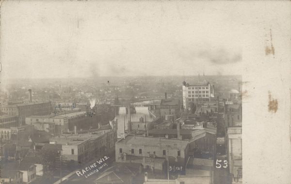 City View Text on front: "Racine, Wis. Looking North." Elevated view of the city's business center, looking North.