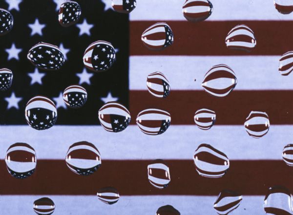 American Flag Abstraction in Color Water droplets capture the image of the American flag.