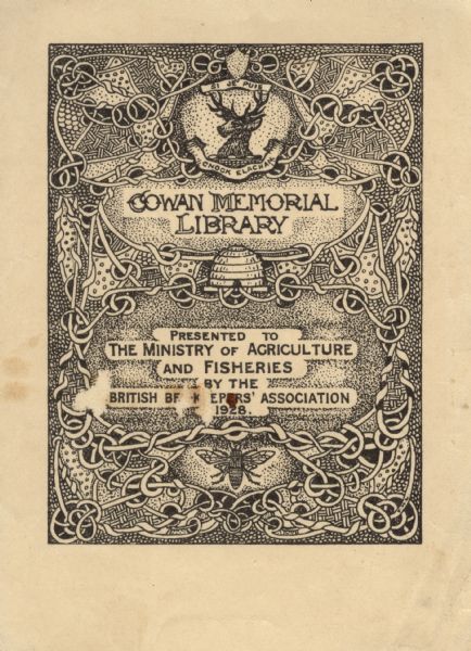 Bookplate from the Cowan Memorial Library presented to the Ministry of Agriculture and Fisheries by the British Beekeepers Association 1928. The illustration includes a background design that weaves around three images: a stag at the top surrounded by the phrase, "Si Je Puis Cnock Elachan," a bee at the bottom, and in the center a bee skep.