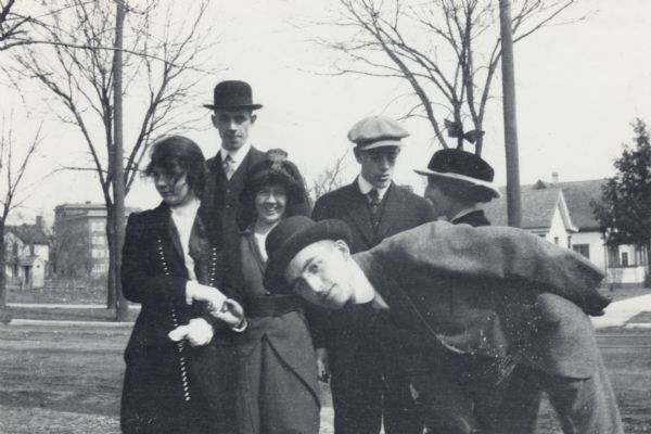 Outdoor group portrait of Arthur Altmeyer as a young man posing in Wingra Park with five other young people identified as Selma, Russell, Lloyd, May Wescott and Diggie.<p>Arthur Altmeyer was a lifelong public welfare advocate, beginning with social security policy formulation in 1934.