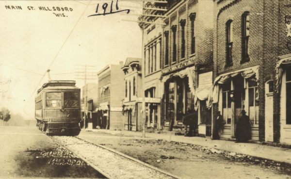 Hillsboro Trolley Composite photograph of a trolley traversing Hillsboro's Main Street. Hillsboro did not actually have a streetcar; the image of the trolley was taken from another photograph and superimposed onto a shot of Main Street.