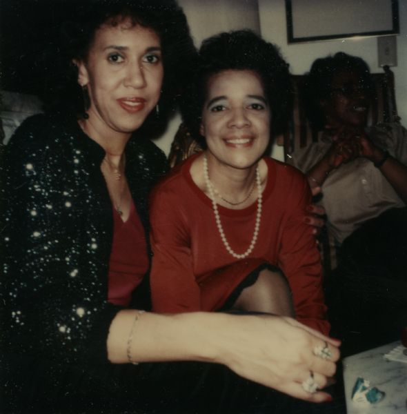 Vel Phillips poses indoors with an unidentified woman.