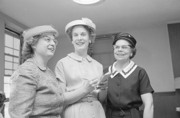 We Saw You at Dietetic Group's Tea Among those attending the Wisconsin Dietetic Association's conference and tea at the U.W. Hospital, were, left to right: Dorothy Hussermann, chairman of the U.W. Department of Foods and Nutrition; Helen Strickland, Wisconsin Dept. of Agriculture nutritionist; and Bea Donaldson, associate professor of home economics at the U.W.