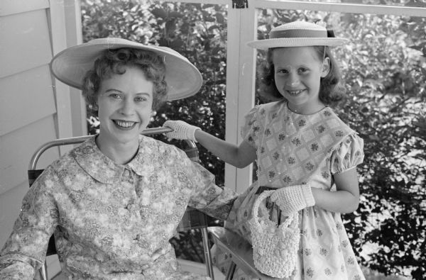 Edwin Stein's Family Photos Portrait of Edwin Stein's wife, Donna, and daughter, Laurie (age 7) wearing hats.