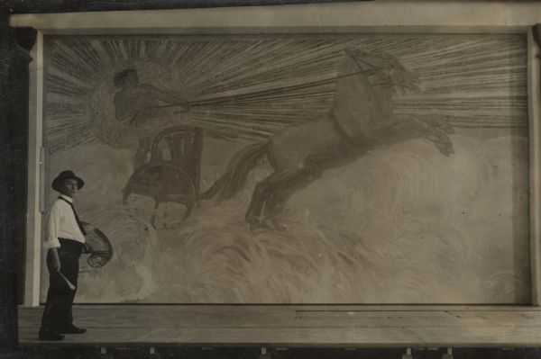 Art During War The pursuit of art during wartime. Professor Albert Maennchen. Berlin, Steglitz. Mural entitled “Baldur” installed in the great hall of the community Fest-Halle Berlin-Lankwitz, just being opended, Berlin.