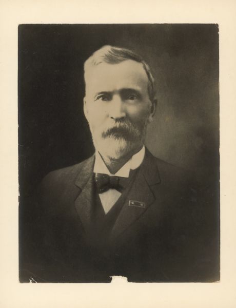 James Herman Agen Quarter-length portrait of a man with a two-star lapel pin. Caption reads: "Agen, James Herman. April 29, 1847 - Oct. 5, 1921. He was born at Montpelier, Vt. and at fifteen ran away from home to join the Union Army as a drummer boy during the Civil War. After the war he settled temporarily in Osage, Ia. where he married Ezilda Lodena Hart. They had five children: Bell L., Millie, Grace, Roy J., and Earl V. During this time Mr. Agen made one or two trips to Juneau, Alaska carrying butter and eggs with him from Seattle, Wash. where his brother was in the butter and eggs business. This was during the Gold Rush and Agen was possibly going to view the situation and make a profit at the same time. Later the family moved to Superior, Wis. where Agen went into real estate. They lived there for some time until Agen had an offer from a Col. Wolvin in Texas City, Texas to come and "clean up the town." Agen went first and later sent for his family. After presumably finishing his business with Wolvin, they settled in Houston, Tex. where he continued in real estate until his death. His son, Earl, now lives in San Ysidro, Cal. and one of his daughters married H.A. Vallas and continues to live in Houston. Cf. letter: H.A. Vallas to William Alderfer, Dec. 1, 1960, in the files of the State Historical Society of Wisconsin."