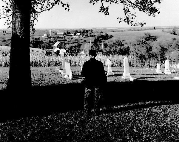 Charles Green, the last survivor of the African American colony at Pleasant Ridge (near Lancaster, WI) looks out over the community graveyard.