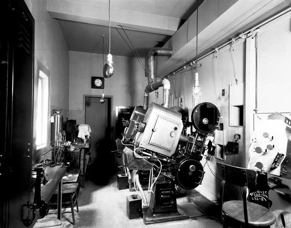 The projection room in the Orpheum Theatre, with projectors and other equipment ready for movie viewing.