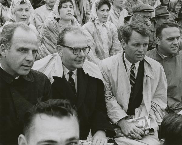 Governor Gaylord Nelson attending a Green Bay Packers-Detroit Lions football game. From left to right: senatorial candidate Gaylord Nelson, gubernatorial candidate John W. Reynolds, Robert Kennedy, and 8th District Congressional candidate Owen Monfils. This photograph was taken during the campaign.