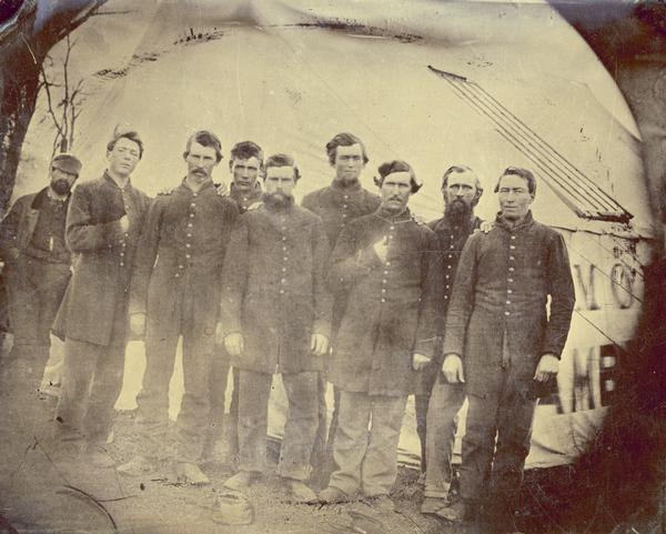 The men in this tintype image were among 500 soldiers taken prisoner at Brentwood on March 25, 1863 and sent to Richmond. They were exchanged for Confederate prisoners and released, and were back in Nashville by June 15, 1863. Private Porter Wait, Company C, of the 22nd Wisconsin Infantry, is the second from the right (with beard).