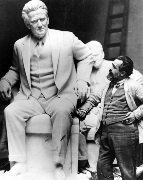 Sculptor Jo Davidson standing next to his larger than life statue of Senator Robert M. La Follette, Sr.  The statue was presented to the National Statuary Hall Collection in the U.S. Capitol in 1929.  Davidson also carved a bust of La Follette from life, a copy of which sits in the rotunda of the Wisconsin State Capitol.