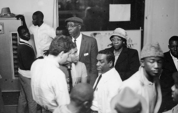 Group of people at the Forrest City court hearing. Two central people are identified as "Joanna" and "Ben." SNCC Arkansas Project.