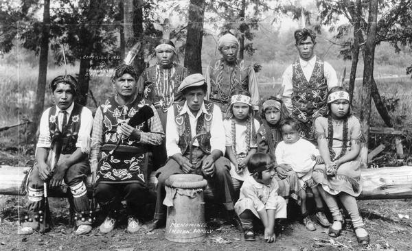 A portrait of a Menominee family in traditional dress. This image is part of an exhibit about Native Americans prepared by Paul Vanderbilt.