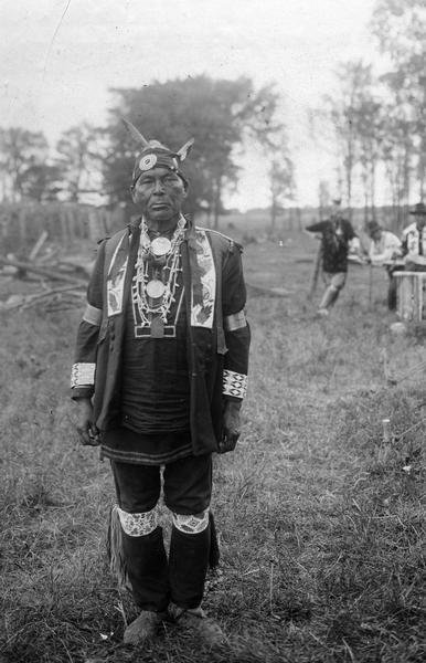 Simon Onanguisse Kahquados (1851-1930) of Forest County, Wisconsin, the last hereditary chief of the Potowatomi. This image is part of an exhibit about Native Americans prepared by Paul Vanderbilt, the Wisconsin Historical Society's first curator of photography.