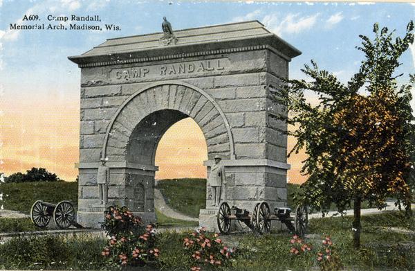 Camp Randall Memorial Arch and Civil War cannons. The memorial was built to honor Wisconsin Civil War soldiers and is located on the University of Wisconsin-Madison campus. Caption reads: "Camp Randall, Memorial Arch, Madison, Wis."