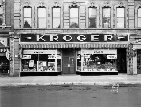 Kroger Complete Food Market, 3-5 North Pinckney Street, with black vitrolite front, chromium trim, and a modernistic Art Deco sign in chromium-plate letters.