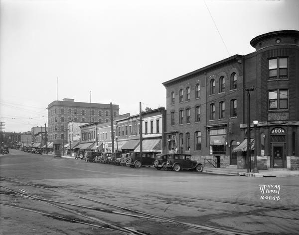 View across railroad tracks towards the Elver House, later the Wilson Hotel, on East Wilson Street.
