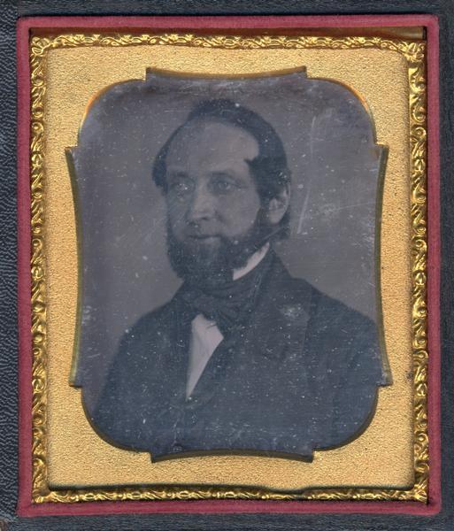 Sixth plate daguerreotype of Leonard J. Farwell, Governor of Wisconsin 1852-54. Quarter length facing left, wearing full beard, coat, vest, tie, and white shirt with stand collar. 