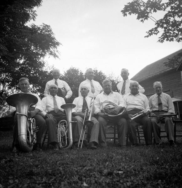 Members of the Yuba (Bohemian) Band posing outdoors.