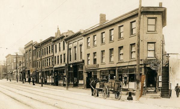 View across street towards the north side of the 200 block of State Street between Fairchild and Henry Streets. This side was free of saloons. The south side was known as the saloon side.