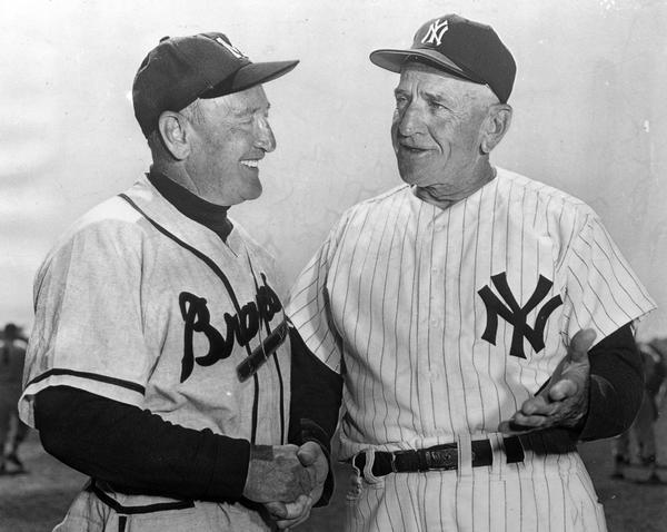 Fred Haney, manager of the 1958 National League pennant winning Milwaukee Braves, confers with his American League counterpart, Casey Stengel, manager of the New York Yankees. The two teams met for the World Series, with the Yanks coming from a 3-1 deficit to win the Major League title.