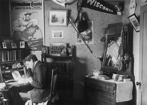 A student studies in his dorm room.