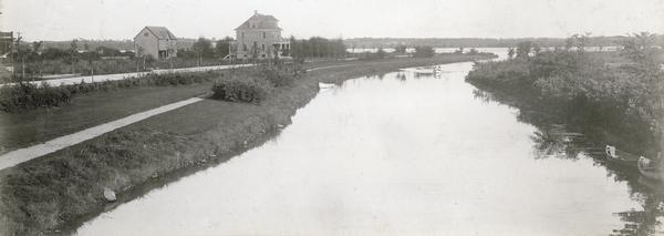 The Yahara River from Williamson Street with Lake Monona in the background.  House & Barn pictured is located at 601 Riverside Drive.