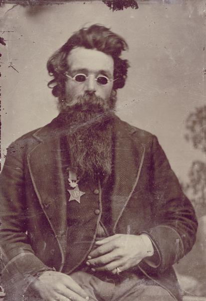 Francis Jefferson Coates of the 7th Wisconsin who earned the Medal of Honor for bravery at the Battle of Gettysburg. Sergeant Coates was so severely wounded during the battle that he lost the sight of both eyes. In this photograph, which dates from after the war, Coates is wearing his medal.