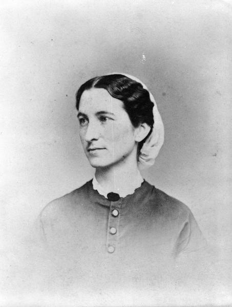 Vignetted carte-de-visite portrait of Jane Jennings, a Civil War nurse.  She was raised in rural Green County, Wisconsin, and when her brother Guilford Jennings was wounded in 1863 she attempted to volunteer as a nurse, but was turned down because at the age of 24 she was thought to be too young. After appealing to the head of all the Washington D.C. hospitals she was allowed to serve. At the age of 59 she volunteered again during the Spanish-American War. She died on December 31, 1917 of a stroke.