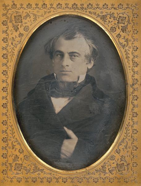 Half plate daguerreotype of Governor William Barstow (1813-1865). Quarter-length portrait, facing forward, hand-in-waistcoat. 