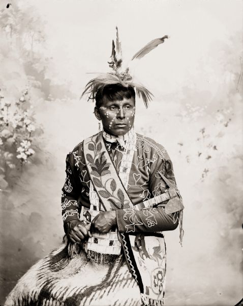 Posed portrait of Ho-Chunk man, Young Eagle, also called Chack-Scheb-Nee-Neik-Ah.