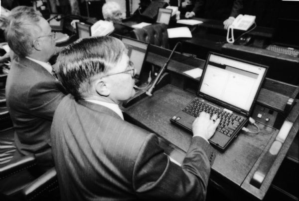 Legislator working on a computer.
