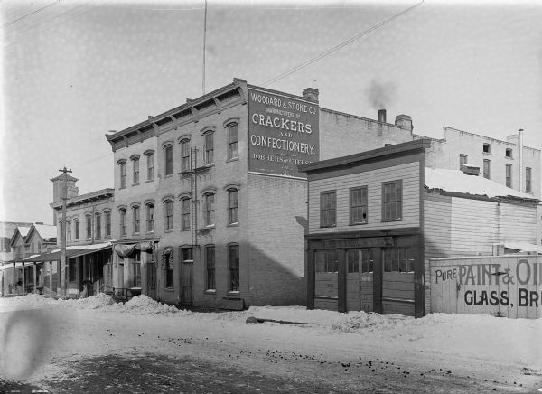 Exterior view of the Woodard & Stone Co. on the first block of North Water Street.